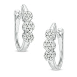 Pre-Owned Zales 1/4ct tw Diamond Flower Huggie Earrings in 10k White Gold