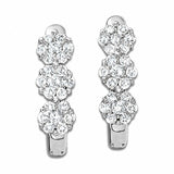 Pre-Owned Zales 1/4ct tw Diamond Flower Huggie Earrings in 10k White Gold