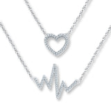 Pre-Owned Kay 1/6ct tw Diamond Heartbeat Necklace in Sterling Silver